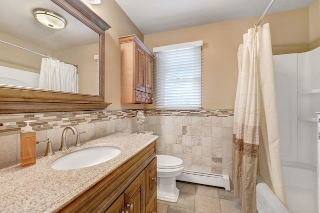 278 Fort Van Tyle Rd, Port Jervis, NY 12771 - full bathroom with a baseboard heating unit, vanity, tile patterned flooring, tile walls, and shower / bath combination with curtain