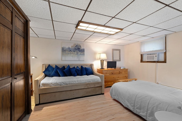 278 Fort Van Tyle Rd, Port Jervis, NY 12771 - bedroom with light wood-type flooring, a drop ceiling, and cooling unit