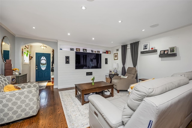 487 Court Ave, Cedarhurst, NY 11516 - living area featuring ornamental molding, wood finished floors, arched walkways, and recessed lighting