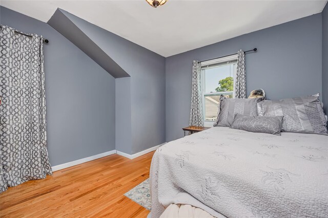 487 Court Ave, Cedarhurst, NY 11516 - bedroom with wood finished floors and baseboards