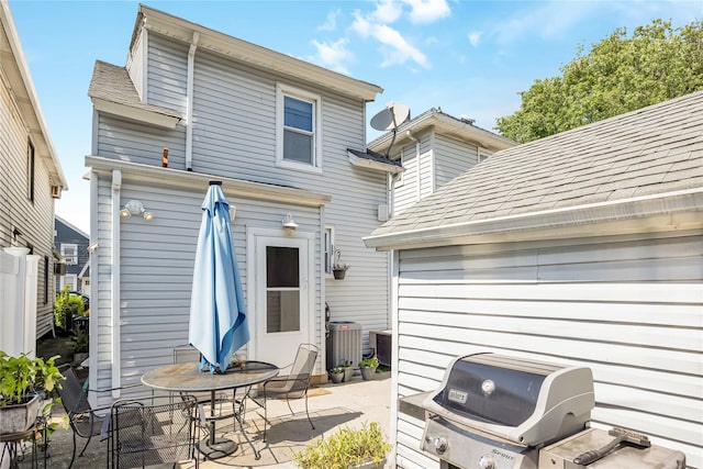 487 Court Ave, Cedarhurst, NY 11516 - rear view of house featuring a patio and outdoor dining area