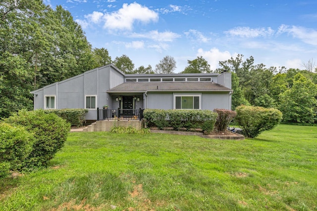 49 Flower Rd, Hopewell Junction, NY 12533 - view of front of property featuring a front yard
