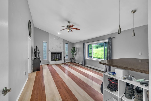 49 Flower Rd, Hopewell Junction, NY 12533 - living area with lofted ceiling, light wood-style flooring, ceiling fan, and a premium fireplace