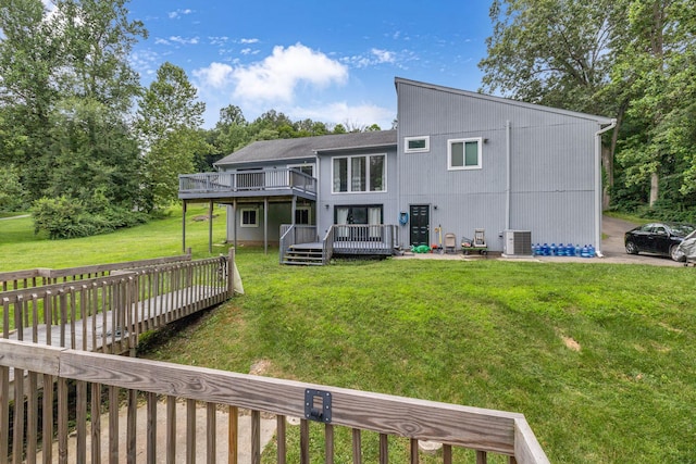 49 Flower Rd, Hopewell Junction, NY 12533 - back of house with a wooden deck and a yard
