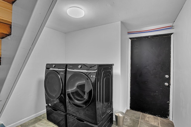 49 Flower Rd, Hopewell Junction, NY 12533 - washroom featuring washing machine and clothes dryer and baseboards