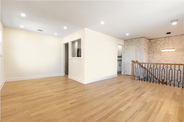 37 Martha St, Freeport, NY 11520 - empty room with light wood finished floors and recessed lighting