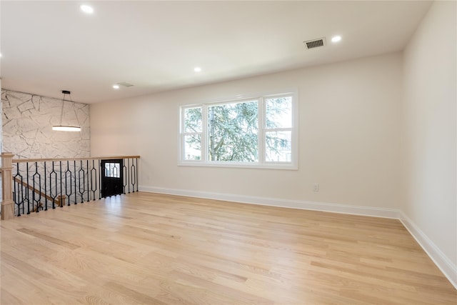 37 Martha St, Freeport, NY 11520 - unfurnished room with wood finished floors and recessed lighting