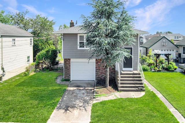 37 Martha St, Freeport, NY 11520 - view of front of house with concrete driveway, brick siding, an attached garage, a chimney, and a front lawn