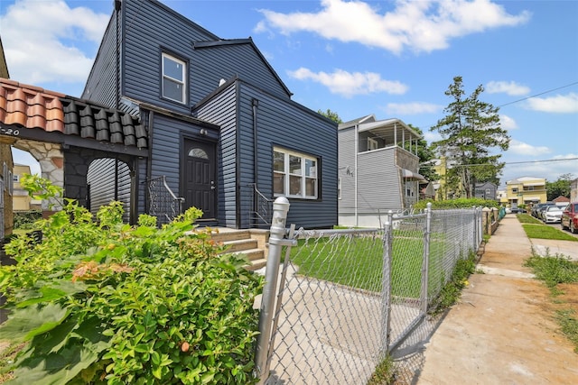 234-16 134th Rd, Laurelton, NY 11422 - view of front of property with a gate