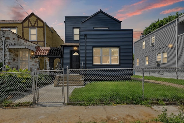 234-16 134th Rd, Laurelton, NY 11422 - view of front of home with a fenced front yard and a gate