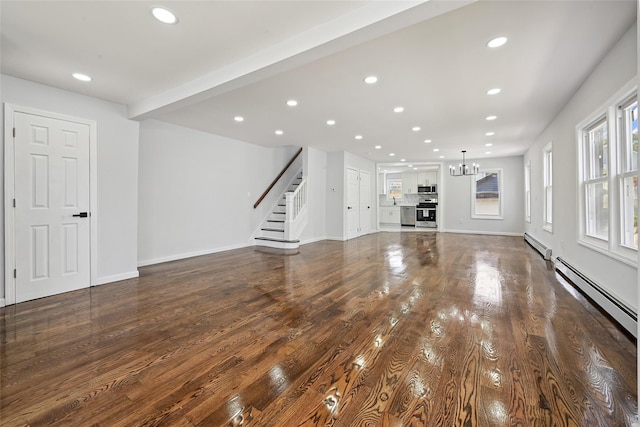 234-16 134th Rd, Laurelton, NY 11422 - unfurnished living room featuring recessed lighting, baseboard heating, a chandelier, stairway, and dark wood-type flooring