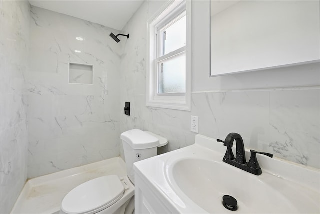 234-16 134th Rd, Laurelton, NY 11422 - full bath featuring a marble finish shower, tile walls, and vanity