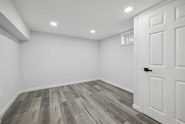 234-16 134th Rd, Laurelton, NY 11422 - basement with wood finished floors and recessed lighting