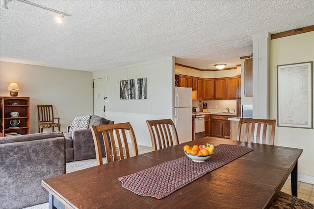 7-24 166th St Unit 8C, Beechhurst, NY 11357 - dining space featuring a textured ceiling