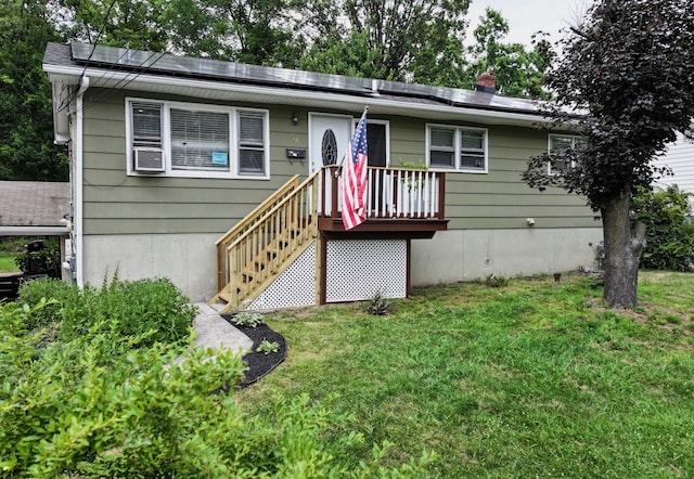 16-18 Claremont Ct, Middletown, NY 10940 - view of front of property featuring a front lawn and solar panels