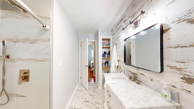 16-18 Claremont Ct, Middletown, NY 10940 - bathroom featuring marble finish flooring, vanity, and a shower