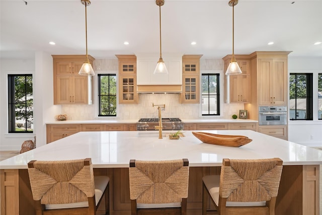 23 Sylvan Rd, Rye Brook, NY 10573 - kitchen with oven, recessed lighting, tasteful backsplash, light countertops, and range