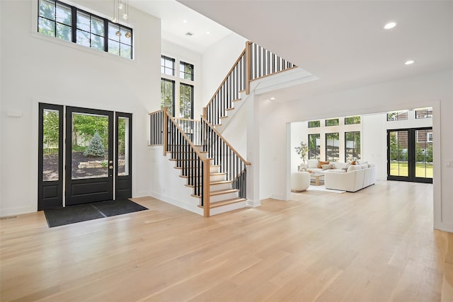 23 Sylvan Rd, Rye Brook, NY 10573 - entryway with a high ceiling, wood finished floors, recessed lighting, and stairway