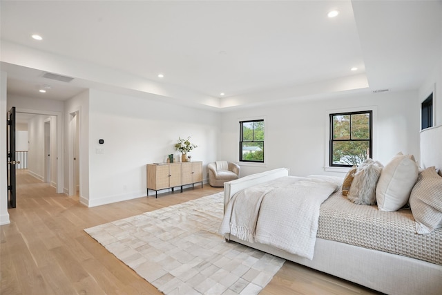 23 Sylvan Rd, Rye Brook, NY 10573 - bedroom with light wood-style floors, recessed lighting, and a tray ceiling