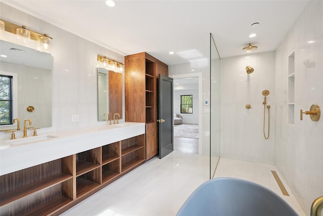 23 Sylvan Rd, Rye Brook, NY 10573 - ensuite bathroom with double vanity, a shower, a freestanding bath, recessed lighting, and tile patterned floors