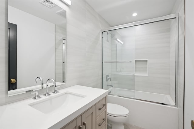 23 Sylvan Rd, Rye Brook, NY 10573 - full bathroom featuring vanity, bath / shower combo with glass door, and recessed lighting