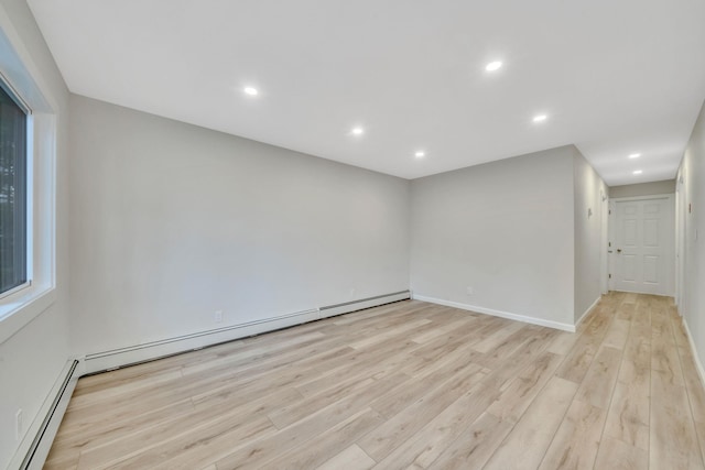 3 Auburn Ave, Bay Shore, NY 11706 - empty room featuring a baseboard radiator, light wood finished floors, and recessed lighting