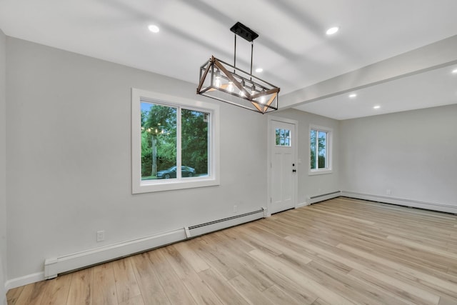 3 Auburn Ave, Bay Shore, NY 11706 - unfurnished dining area featuring baseboard heating, a chandelier, light wood-type flooring, and recessed lighting