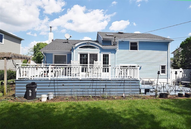 38 Loretta Dr, Syosset, NY 11791 - back of house with a wooden deck, a lawn, and a chimney