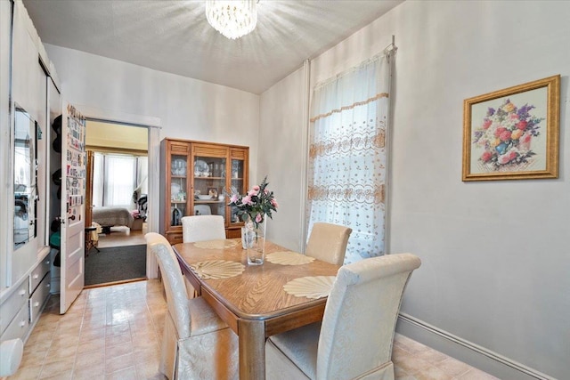 59-30 70th Ave, Ridgewood, NY 11385 - dining space with a chandelier