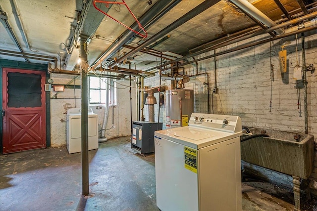59-30 70th Ave, Ridgewood, NY 11385 - below grade area featuring gas water heater and independent washer and dryer