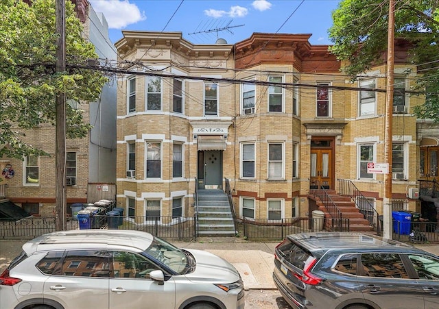 59-30 70th Ave, Ridgewood, NY 11385 - italianate-style house featuring brick siding