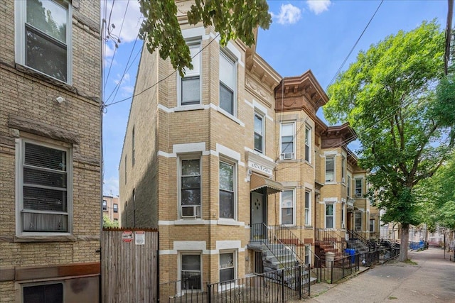 59-30 70th Ave, Ridgewood, NY 11385 - view of property featuring a fenced front yard
