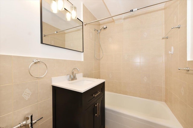 400 E 17th St Unit 600, Brooklyn, NY 11226 - full bathroom featuring tile walls, vanity, and bathtub / shower combination
