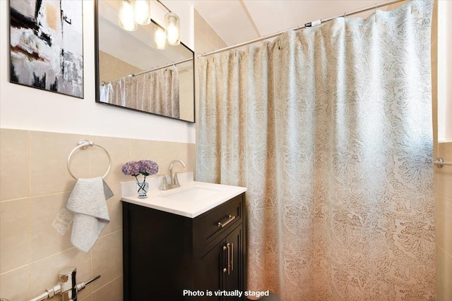 400 E 17th St Unit 600, Brooklyn, NY 11226 - bathroom with tile walls, vanity, and a shower with curtain
