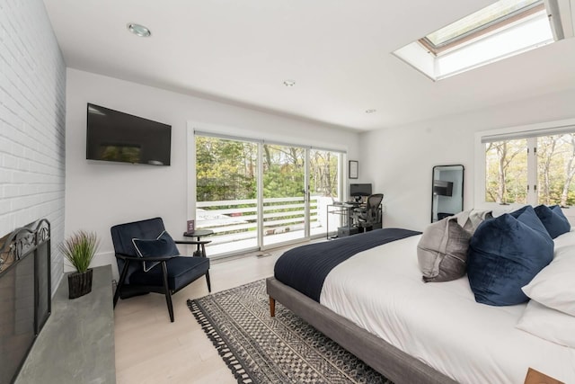 715 Hands Creek Rd, East Hampton, NY 11937 - bedroom featuring a skylight, light wood-style flooring, and recessed lighting