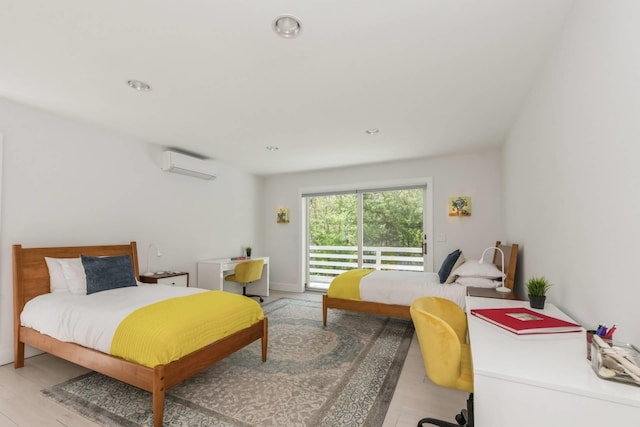 715 Hands Creek Rd, East Hampton, NY 11937 - bedroom with a wall unit AC, access to exterior, wood finished floors, and recessed lighting