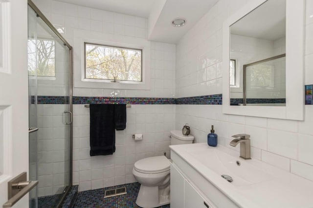 715 Hands Creek Rd, East Hampton, NY 11937 - full bathroom with vanity, a stall shower, tile walls, and tile patterned flooring