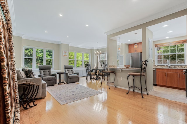 55 Oceana Dr E Unit 1B, Brooklyn, NY 11235 - living area with a chandelier, ornamental molding, light wood finished floors, and recessed lighting