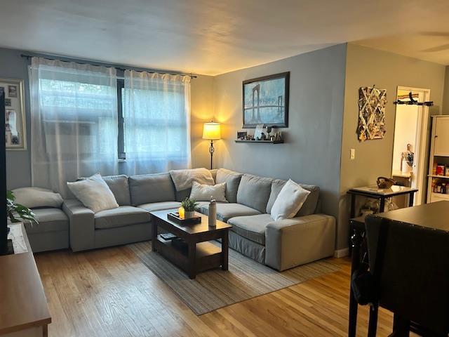 199-39 19th Ave Upper, Upper, Whitestone, NY 11357 - living area featuring wood finished floors