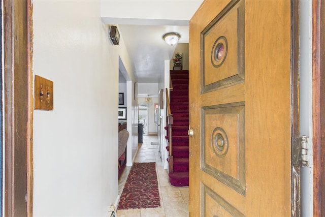 1472 Needham Ave, Bronx, NY 10469 - hall featuring light tile patterned floors and stairs