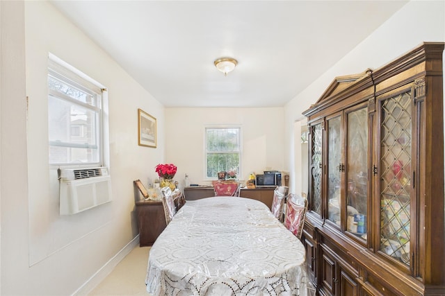 1472 Needham Ave, Bronx, NY 10469 - dining space with baseboards and cooling unit