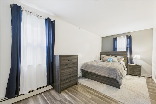 1472 Needham Ave, Bronx, NY 10469 - bedroom featuring wood finished floors and baseboards