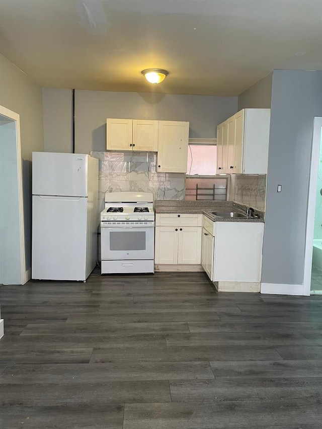 1038 E 224th St, Bronx, NY 10466 - kitchen featuring white appliances, tasteful backsplash, white cabinets, and dark wood-style floors