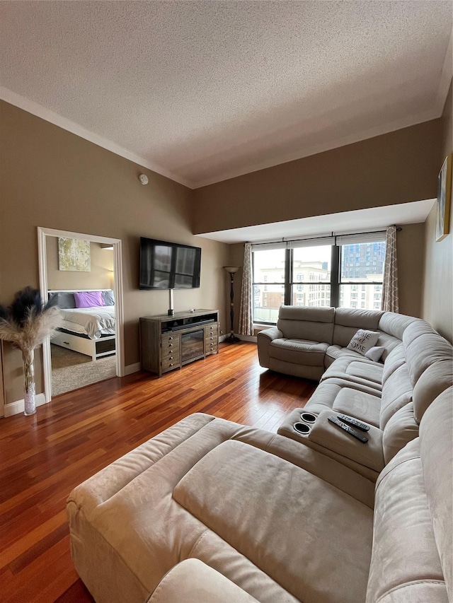 100 New Roc City Plz Unit 414, New Rochelle, NY 10801 - living room with a textured ceiling, light wood-style flooring, and crown molding