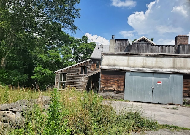 785 S St, Plattekill, NY 12528 - view of side of property featuring a metal roof