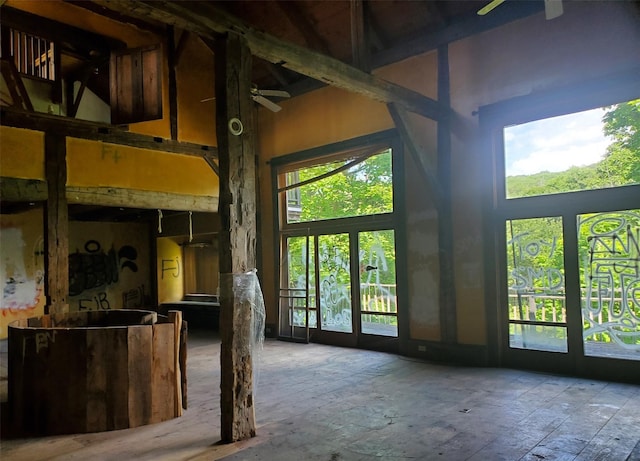 785 S St, Plattekill, NY 12528 - unfurnished living room with a towering ceiling and ceiling fan