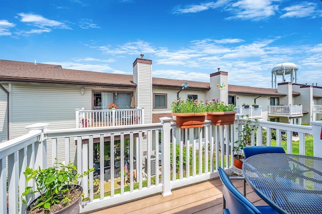 199 Cambridge Dr E, Copiague, NY 11726 - view of wooden deck