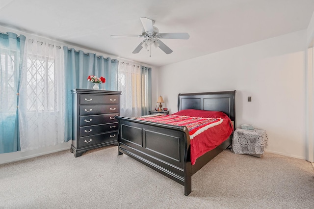 199 Cambridge Dr E, Copiague, NY 11726 - carpeted bedroom with multiple windows and a ceiling fan