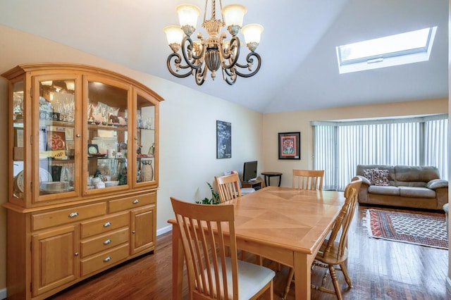 21 Hillvale Rd, Syosset, NY 11791 - dining area with lofted ceiling, dark wood-style floors, a chandelier, and a skylight