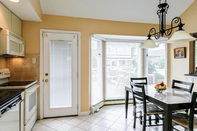 21 Hillvale Rd, Syosset, NY 11791 - dining space featuring light tile patterned floors and healthy amount of natural light